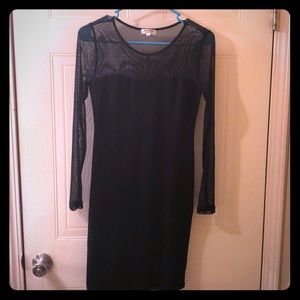 Thigh length black dress